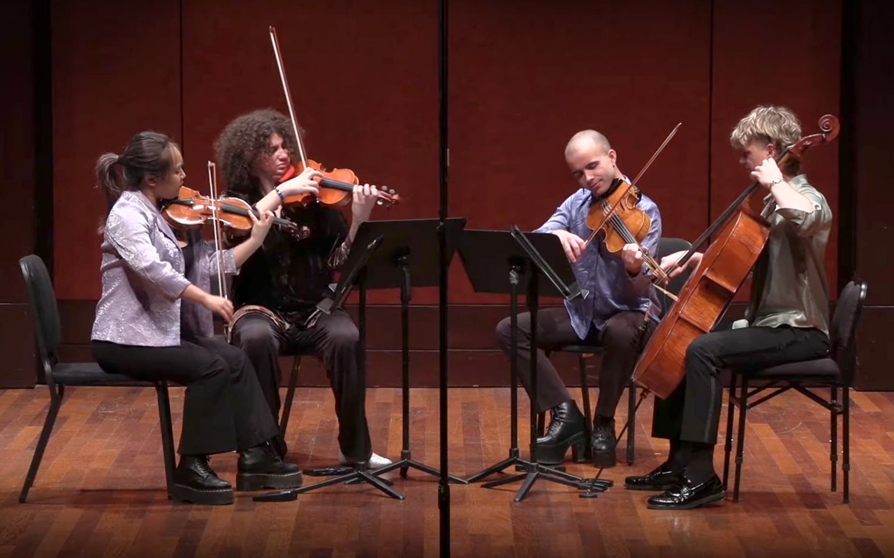 The Poiesis Quartet perform together on the Werner Recital Hall stage.