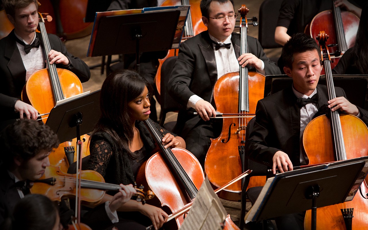 Cello students perform on the Corbett Auditorium satge during the Moveable Feast benefit.