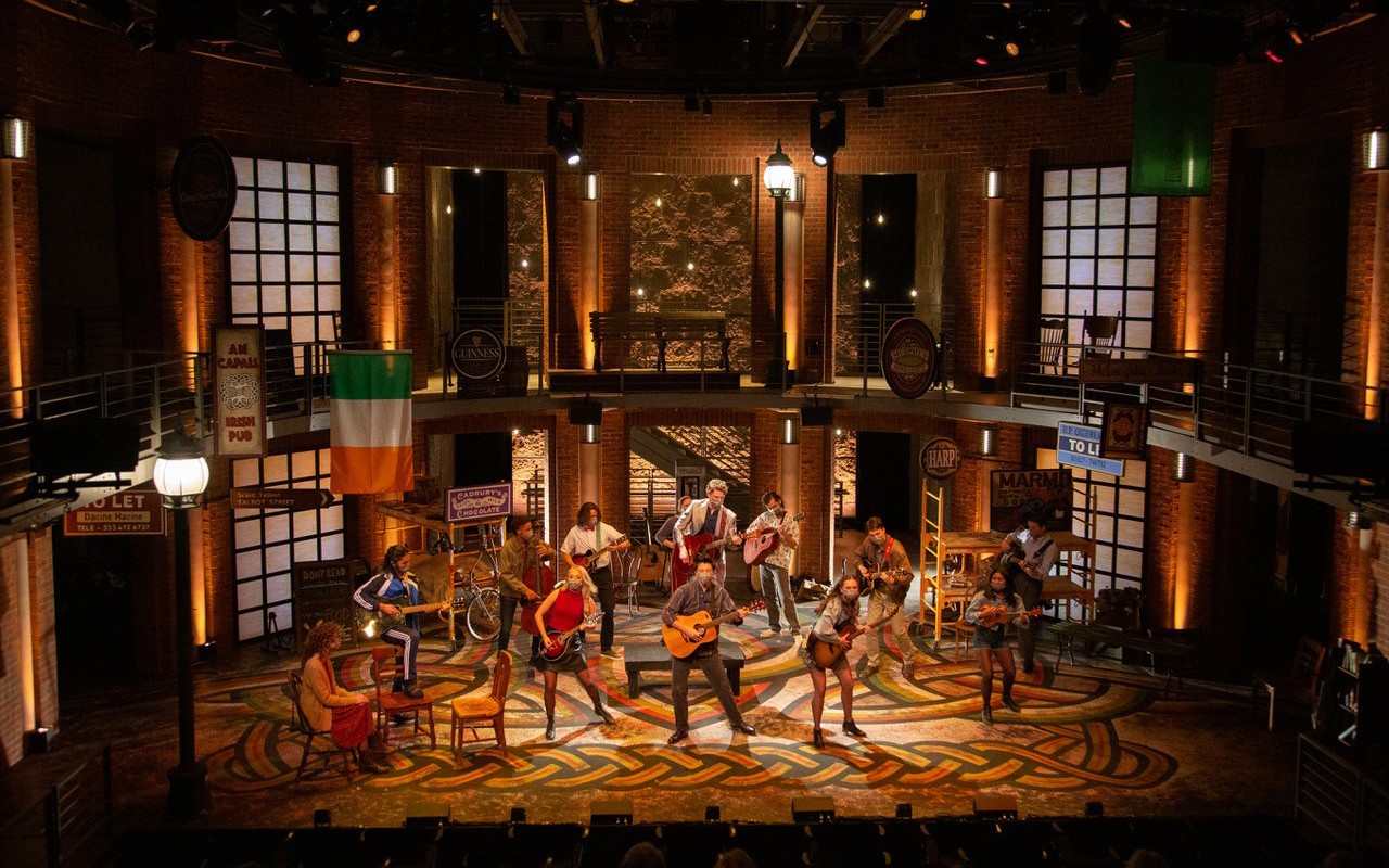 Students performing in a photo of CCM's Nov. 2021 production of "Once."