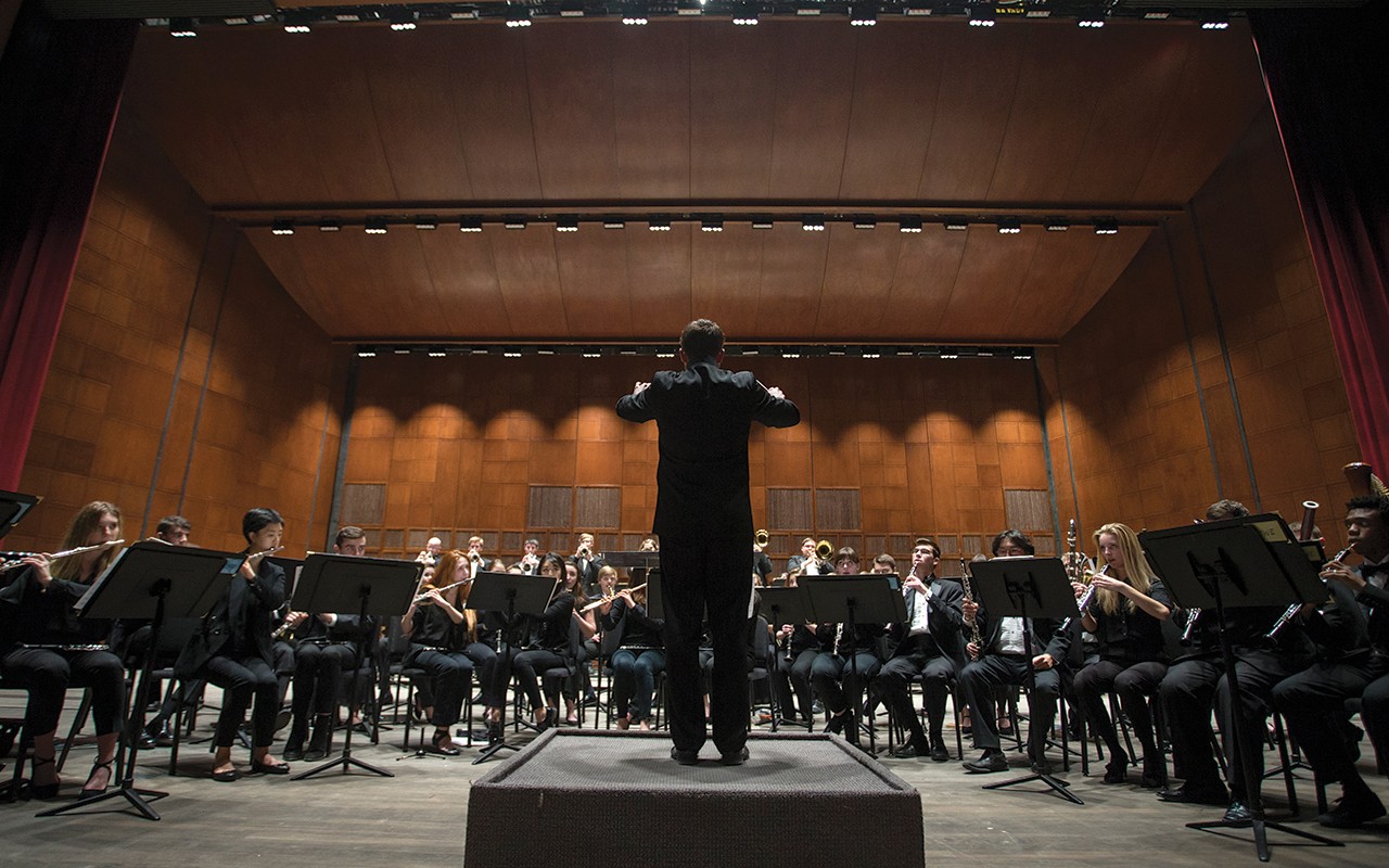The CCM Wind Ensembles rehearses in Corbett Auditorium with Maestro Kevin Holzman