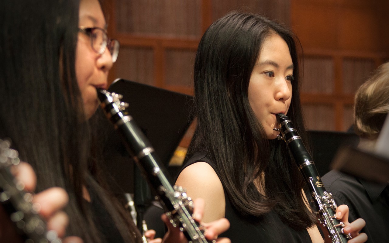 Two girls play clarinets with the CCM Youth Wind Ensemble