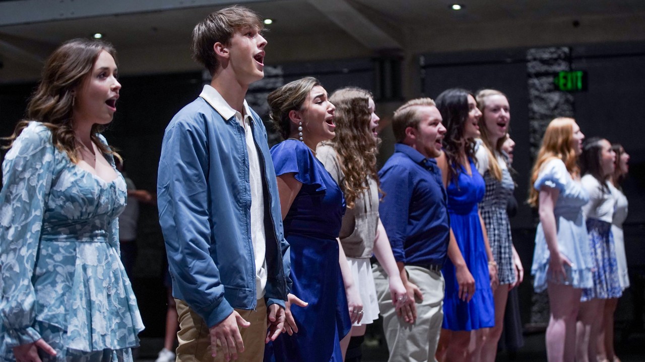 Students perform on stage during CCM Prep's High School Musical Theatre Workshop